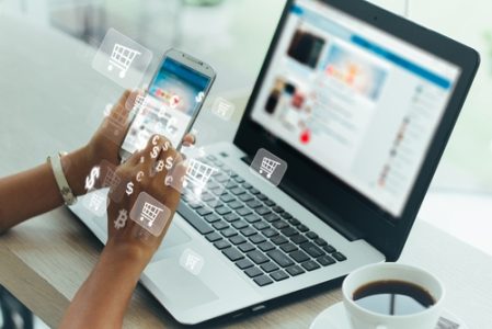 Businesswoman,Phone,And,Laptop,Using,,,Online,Shopping,Concept.